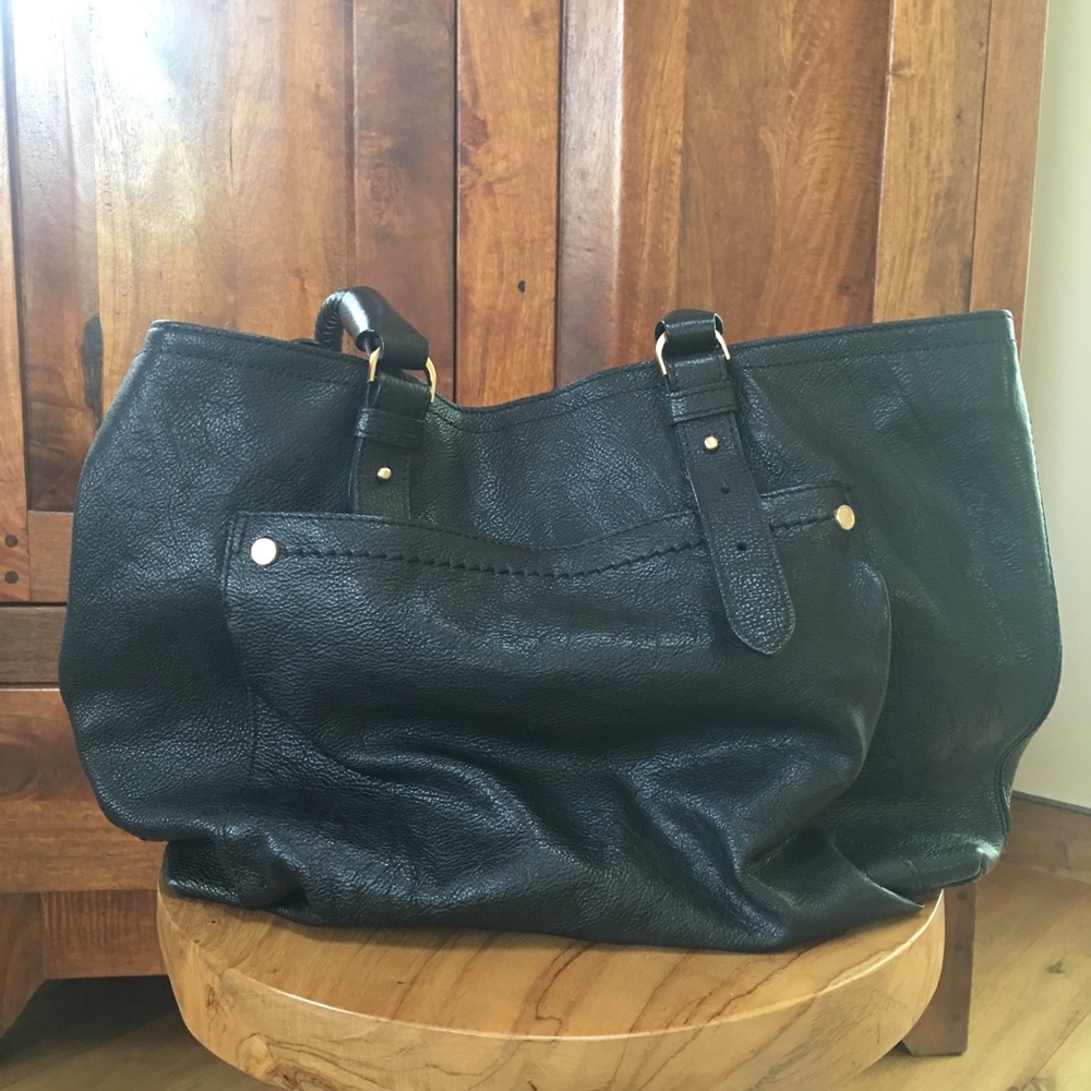 Cole Haan Pebbled black leather bag.